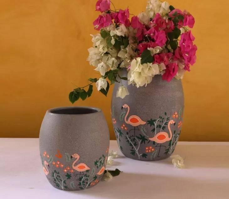 A flower vase is an exquisite piece from the assortment of home decor accessories to flourish your interiors with freshness and an elegant appeal. 