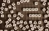 Scrabble tiles making Latin words